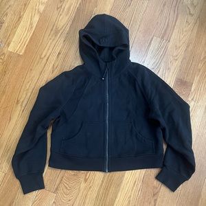 New without tags black lulu lemon zip up jacket/hoodie. Cropped fit. Size small.